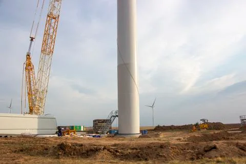 Wind turbine construction site, installation of a windmill crane. Ecological  Fotos de archivo