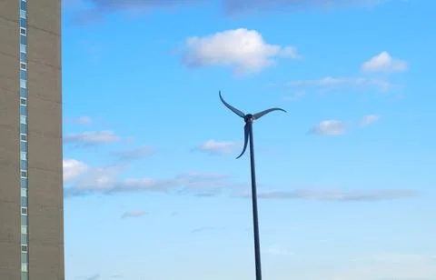 Wind turbine efficiency small generator for building alternative power green Stock Photos
