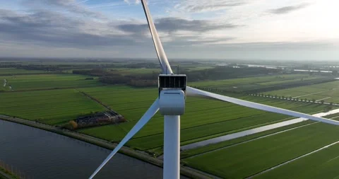 Wind turbine. Electricity, an ecological saving and alternative power source Stockbeeldmateriaal 295860617