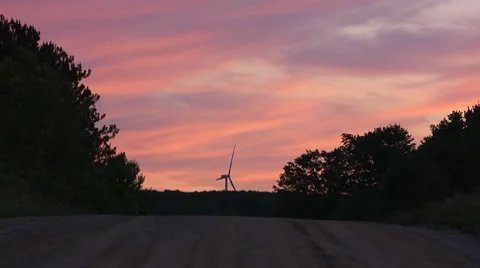 Wind Turbine at End of Road Stock Footage 7745857