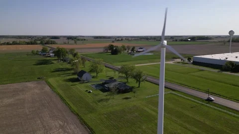 Wind turbine on a farm Stock Footage 244351712