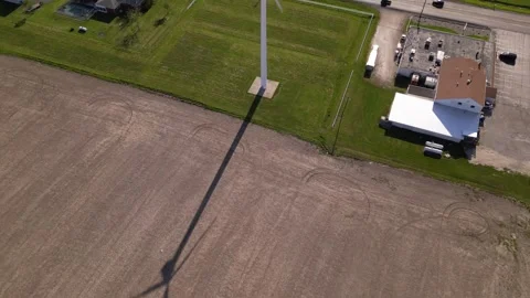 Wind turbine on a farm Stock Footage 244351725