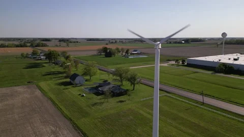 Wind turbine on a farm Stock Footage 244351773