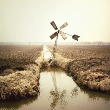 Wind turbine on field Stock Photos