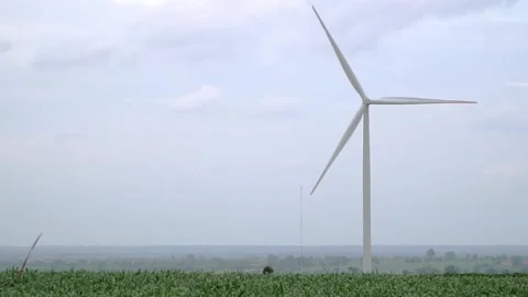 The wind turbine in fields with clouds background. Stock Footage 172100112