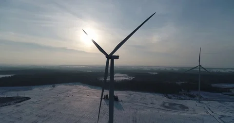 Wind turbine in front of sun Stock Footage 95065903