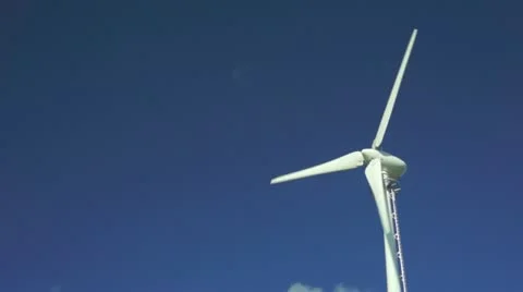 Wind turbine generator on blue sky background 스톡 동영상 10849176