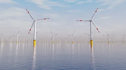 Wind turbine generator field located in the open sea at day. Realistic 3D Video stock 168293972