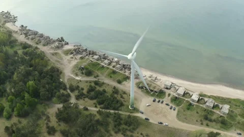 Wind turbine generators in field producing clean ecological 動画素材 209614577