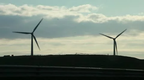 Wind turbine on highway Stock Footage 10590260