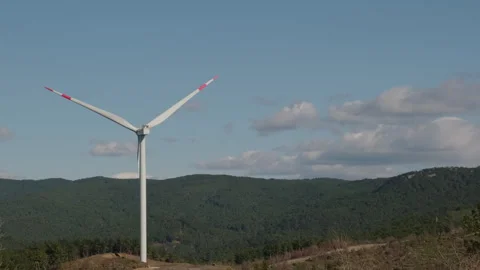 Wind Turbine on a Hillside Stock Footage 282926347