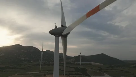 Wind turbine installation at sunset in renewable energy project Stock Footage 309426032