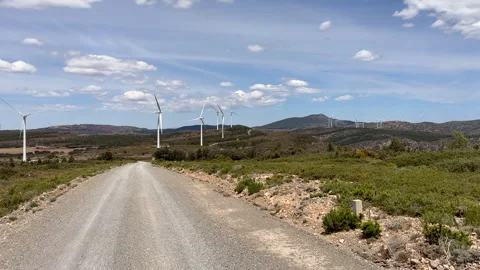 Wind turbine in mountains. Eolic park windpower. Wind farm Stock Footage 251589056