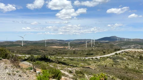 Wind turbine in mountains. Eolic park windpower. Wind farm Stock Footage 251589680