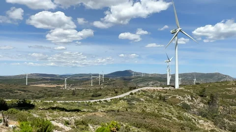 Wind turbine in mountains. Eolic park windpower. Wind farm Stock Footage 251589767