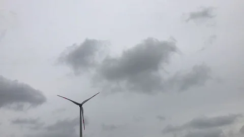 Wind turbine moving in front of sky Stock Footage 120137918
