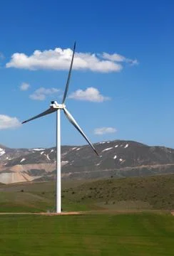 Wind turbine at nice spring day Stock Photos