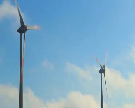 Wind turbine powered electrical generator, windmill blades work, click for HD Stock Footage 43911906