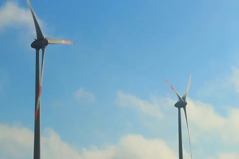 Wind turbine powered electrical generator, windmill blades work, click for HD Stock Footage 43933208
