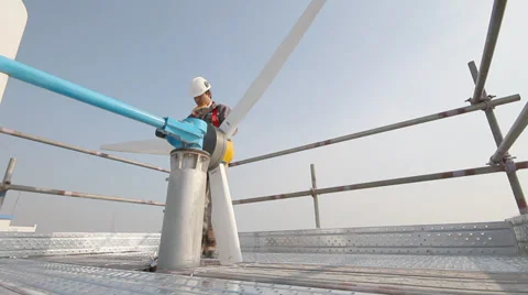 Wind turbine repair by engineer Stock Footage 34133761