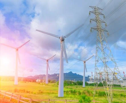 Wind turbine replace old coal power plant with high voltage electricity power Foto stock