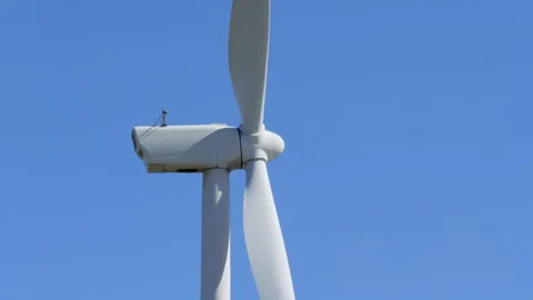 Wind turbine rotating producing clean energy 库存影片 343865958