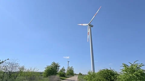 Wind turbine rotating propellers generating renewable energy Video stock 342926119