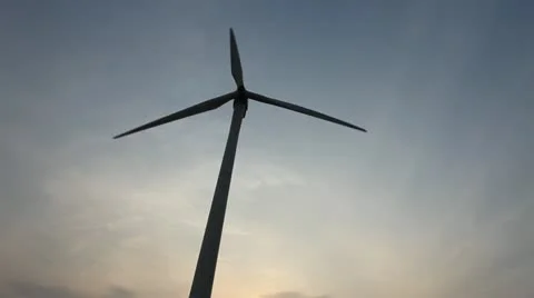 Wind turbine rotating  under sky Stock Footage 22149371