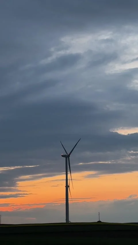 Wind Turbine Silhouette at Dramatic Sunset Sky Stock Footage 335811335