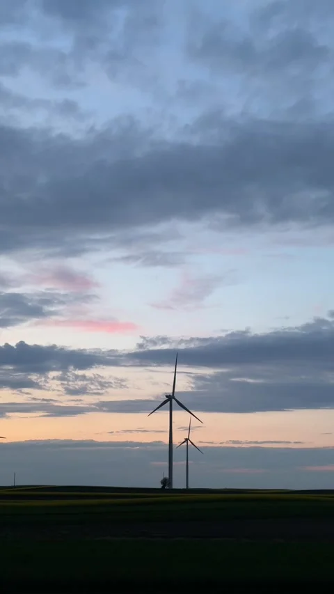 Wind Turbine Silhouette at Dramatic Sunset Sky Stock Footage 335811387