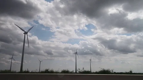 Wind turbine on sky background Stock Footage 82354521