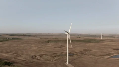 Wind Turbine slow circle around with muliple turbines in final frames Stock Footage 116014743