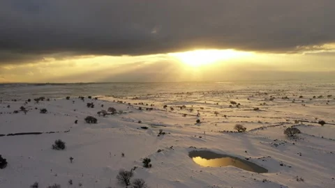 Wind Turbine, Snow, Clouds and Sunset Stock Footage 149046517