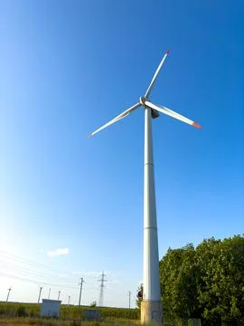 Wind turbine is a source of renewable environmental electricity Stock Photos