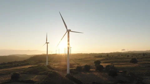 Wind turbine at sunrise light Stock Footage 253207305