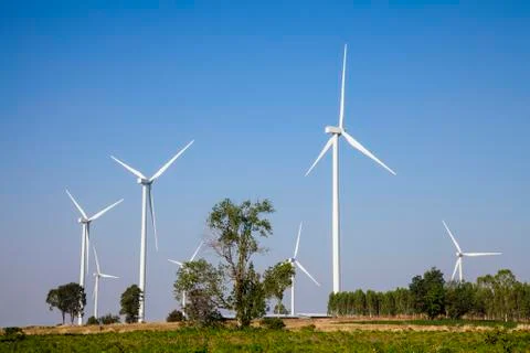 Wind turbine sunset background ecosystem vintage Stock Photos