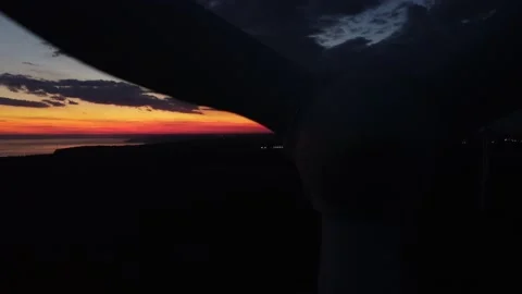 Wind turbine at sunset close-up Stock Footage 219937094