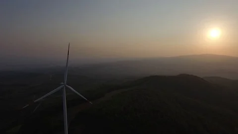 Wind turbine on sunset Stock Footage