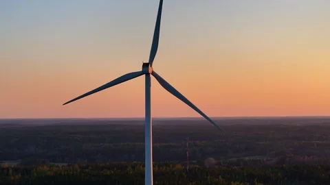 Wind turbine in the sunset Stock Footage 242260442