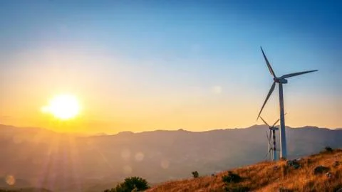 Wind turbine at sunset Foto stock