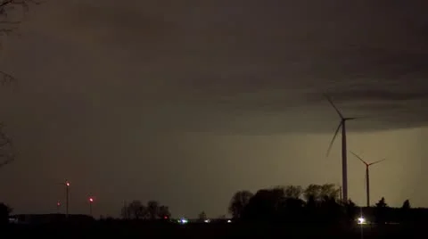 Wind Turbine Time Lapse with lightning Stock Footage 11631041