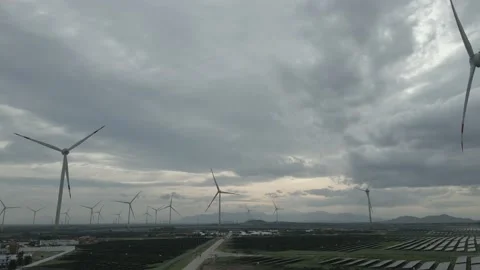 Wind Turbine Tower Working To Generate Renewable Energy &amp; Reduce Global Warming Stock Footage 153374787