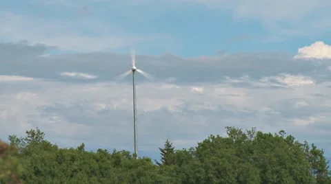 Wind Turbine Trees and Clouds Stock Footage 8601701