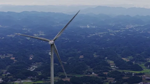 Wind Turbine in Twilight Hills Clockwise Aerial Orbit 4K HLG Stock Footage 345625357