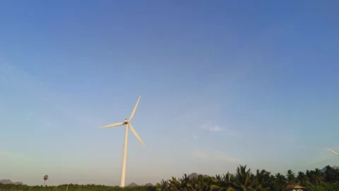 Wind Turbine Under Clear Sky Stock Footage 313149870