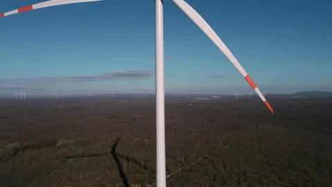 Wind Turbine in a Vast Forest Landscape Stock Footage 282927108
