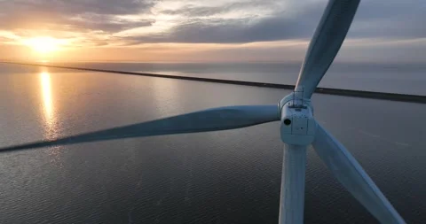 Wind turbine on water, close up view, renewable energy. Aerial drone view. Stock Footage 301998250