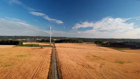 Wind turbine on wheat field Stockbeeldmateriaal 93036285