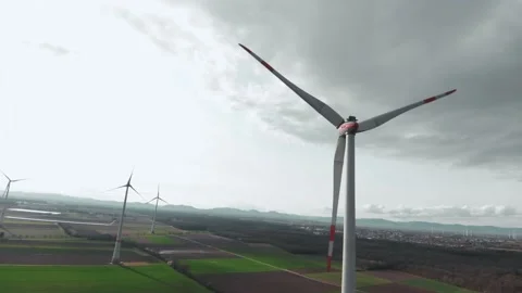 Wind turbine in a wield field Stock Footage 236012205