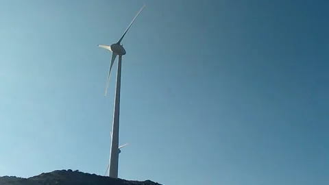 Wind turbine wind energy wind power south rethimno Video stock 136757724
